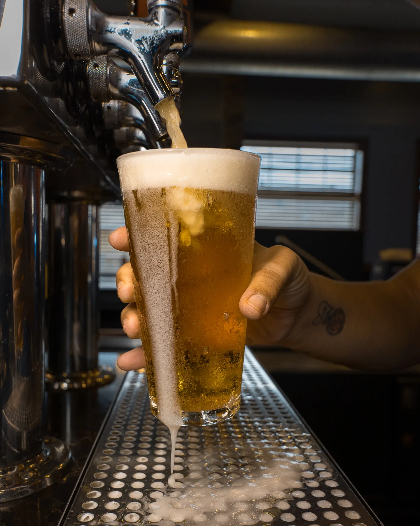 A cold draft beer being poured at 212 The Boiling Point in Brandon, SD