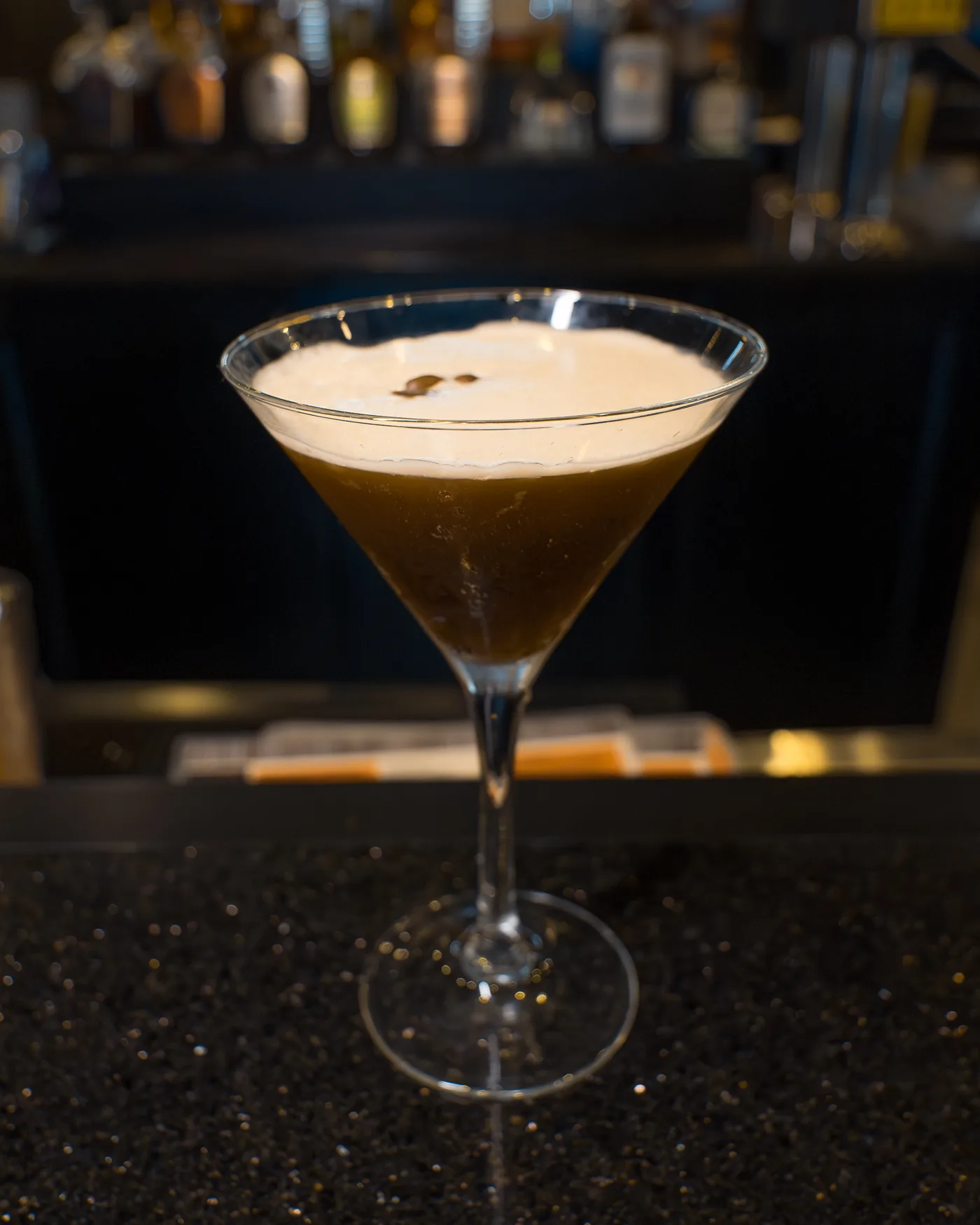 An espresso martini on the granite bar top at 212 An espresso martini on the granite bar top at 212