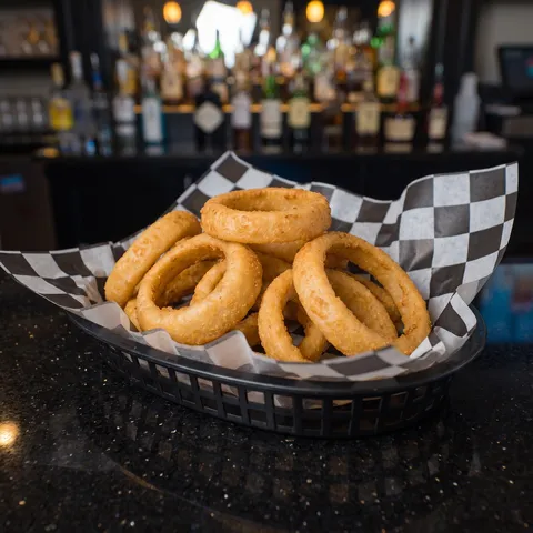 Onion Rings at 212 The Boiling Point: 8 oz. of lightly breaded onion rings