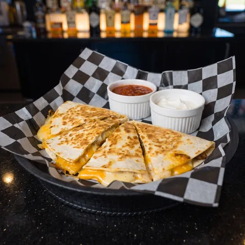 Quesadilla at 212 The Boiling Point: Toasted flour tortilla stuffed with a cheese blend, house made queso cheese, and choice of chicken or smoked pull