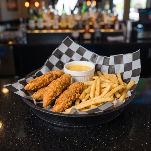 Chicken Strips at 212 The Boiling Point: Four crispy chicken tenders served with your choice of sauce