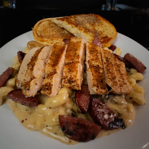Cajun pasta with grilled chicken, jalapeno sausage and Texas toast