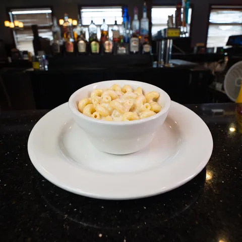 Kids Alfredo Pasta at 212 The Boiling Point: A small white bowl of cavatappi corkscrew pasta in creamy white alfredo sauce. NO chicken, no meat. Small