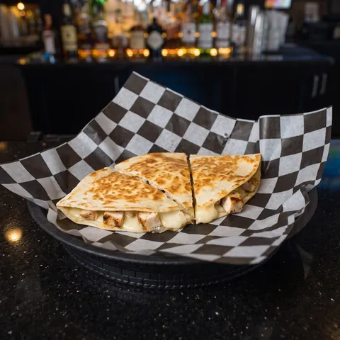 Kids Chicken Quesadilla at 212 The Boiling Point: A small toasted flour tortilla quesadilla cut into three wedges with diced grilled chicken and melte
