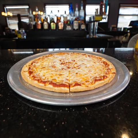 Kids thin crust cheese pizza on an aluminum pan