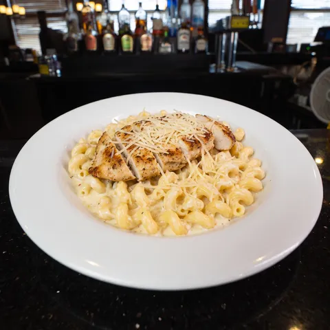 Chicken Alfredo at 212 The Boiling Point: Cavatappi noodles tossed in alfredo sauce and topped with grilled chicken breast and parmesan cheese