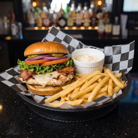 Grilled Chicken at 212 The Boiling Point: Grilled chicken breast, swiss cheese, hickory bacon, lettuce, tomato, onion, pickles, side of mayo