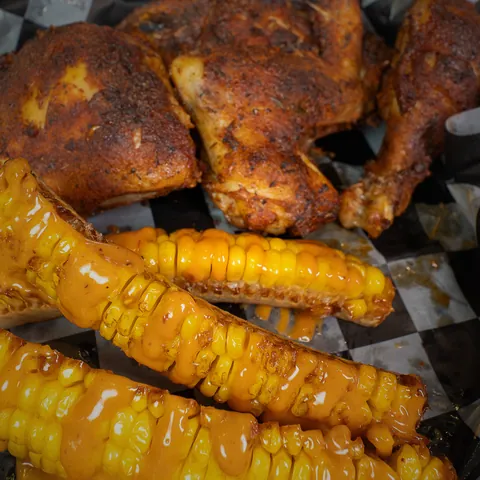 Four piece smoked chicken with corn ribs