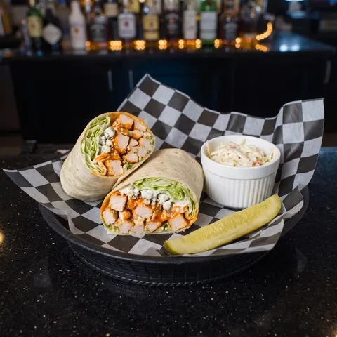Buffalo Bleu Chicken at 212 The Boiling Point: Bed of iceberg lettuce with diced chicken, bleu cheese crumble, ranch and buffalo drizzle wrapped in a 