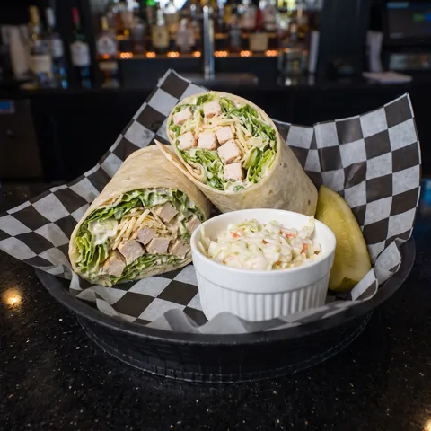 Caesar at 212 The Boiling Point: Bed of romaine lettuce, diced chicken, Caesar dressing, shredded Parmesan cheese in a flour tortilla